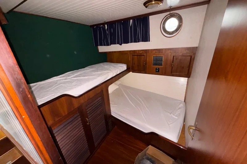 Slide: The Image of Cozy cabin interior with bunk beds on 1982 Custom Virpack Steel Hull boat. - 20