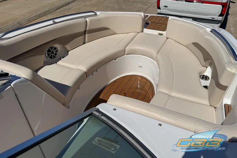 Slide: The Image of 2006 Chaparral Sunesta 274 boat with spacious seating and teak flooring. - 16