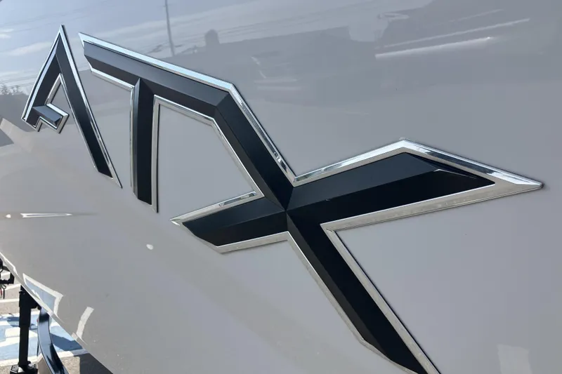 Slide: The Image of Close-up of 2020 ATX Surf Boats 24 Type-S logo on boat exterior. - 10