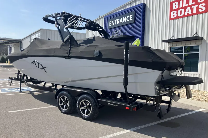 Slide: The Image of 2020 ATX Surf Boats 24 Type-S on trailer at dealership parking lot. - 4