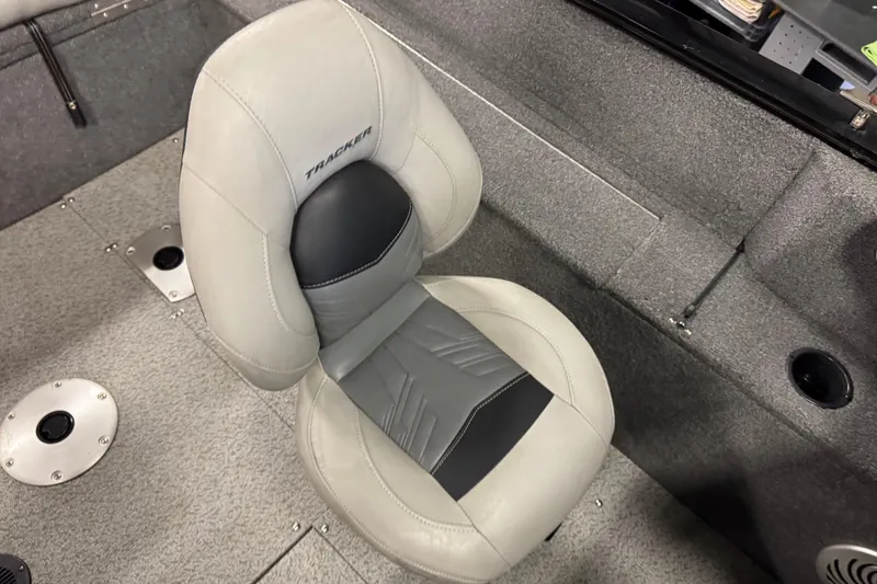 Slide: The Image of 2019 Tracker Pro Guide V-175 Combo boat seat, gray upholstery, interior view. - 10