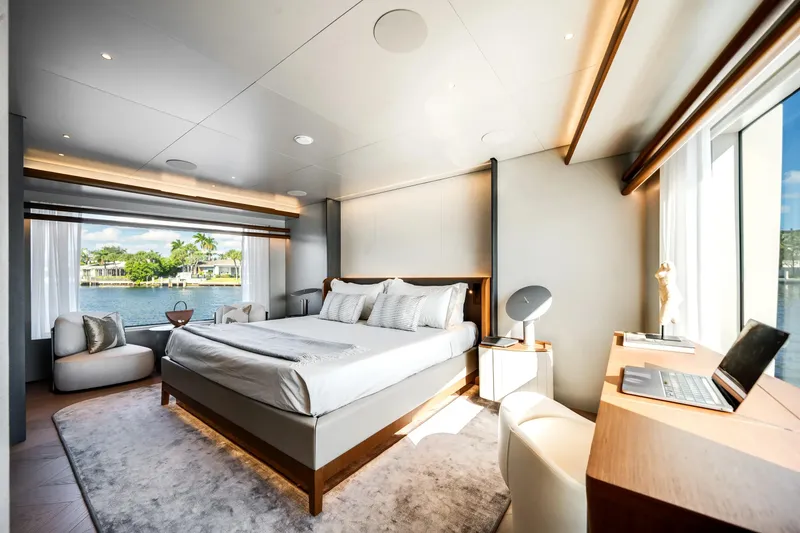 Slide: The Image of Luxurious bedroom interior of 2026 Azimut Magellano 30M yacht with waterfront view. - 13