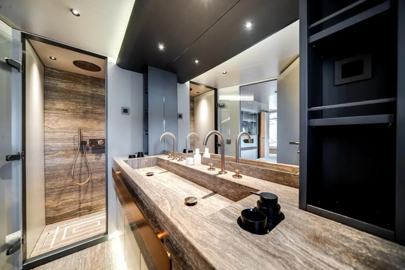 Slide: The Image of Luxurious bathroom in 2026 Azimut Magellano 30M yacht with modern fixtures and elegant design. - 29