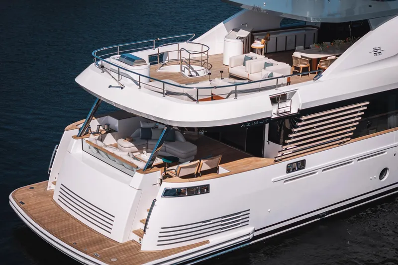 Slide: The Image of Luxurious 2026 Azimut Magellano 30M yacht with elegant deck and seating area. - 3