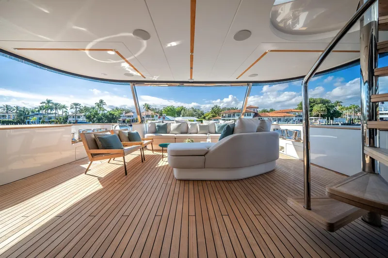 Slide: The Image of Luxurious deck of 2026 Azimut Magellano 30M yacht with elegant seating and scenic views. - 36