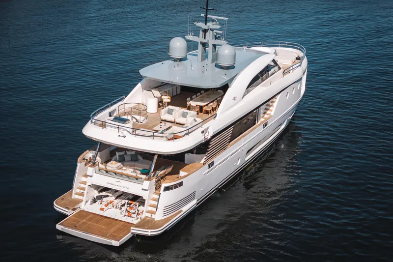 Slide: The Image of Luxurious 2026 Azimut Magellano 30M yacht cruising on serene waters. - 4