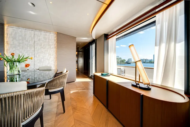 Slide: The Image of Luxurious interior of 2026 Azimut Magellano 30M yacht with elegant dining area. - 43