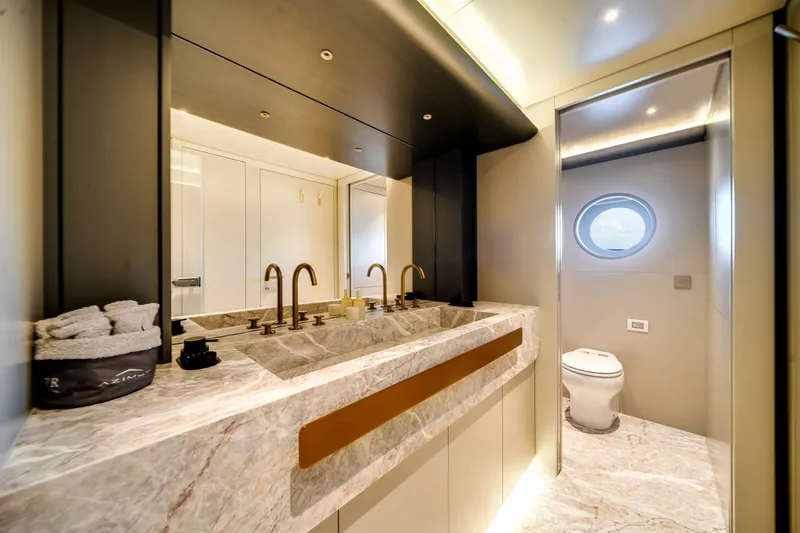 Slide: The Image of Luxurious bathroom on 2026 Azimut Magellano 30M yacht with marble countertops and modern fixtures. - 46