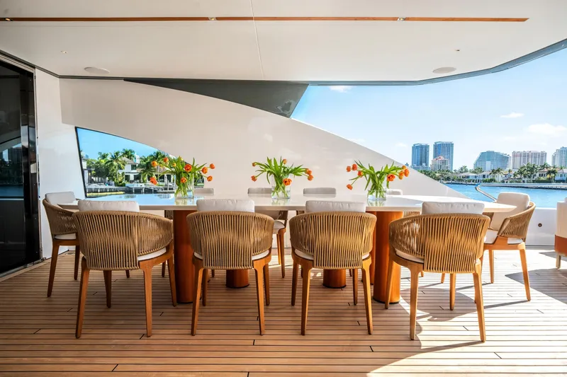 Slide: The Image of Luxurious dining area on 2026 Azimut Magellano 30M yacht with waterfront view. - 48