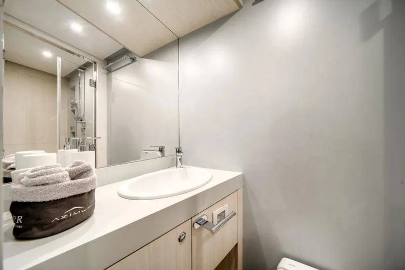 Slide: The Image of Luxurious bathroom on 2026 Azimut Magellano 30M yacht with modern fixtures and elegant design. - 67