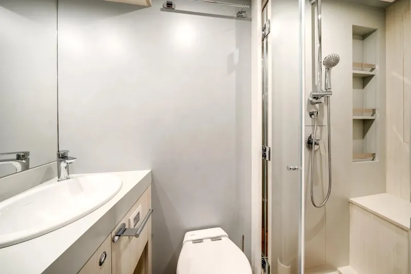 Slide: The Image of Luxurious bathroom in 2026 Azimut Magellano 30M yacht, featuring modern fixtures and sleek design. - 69