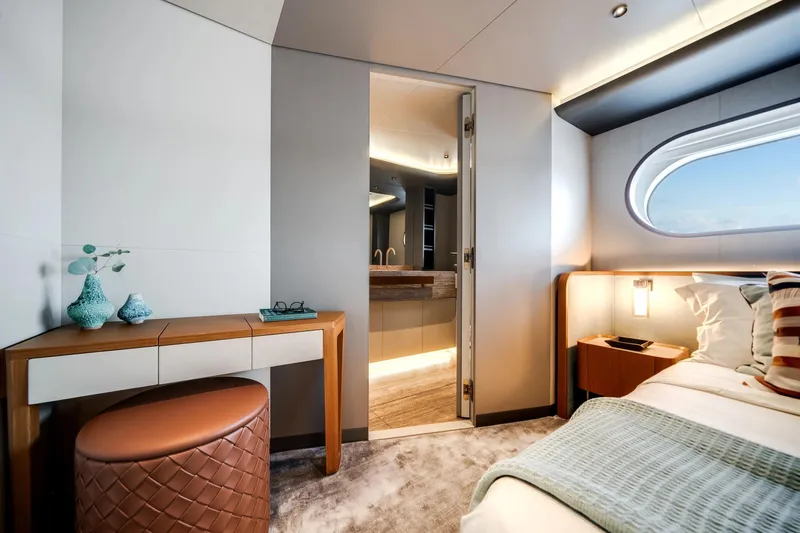 Slide: The Image of Luxurious interior of 2026 Azimut Magellano 30M yacht bedroom with modern decor. - 73