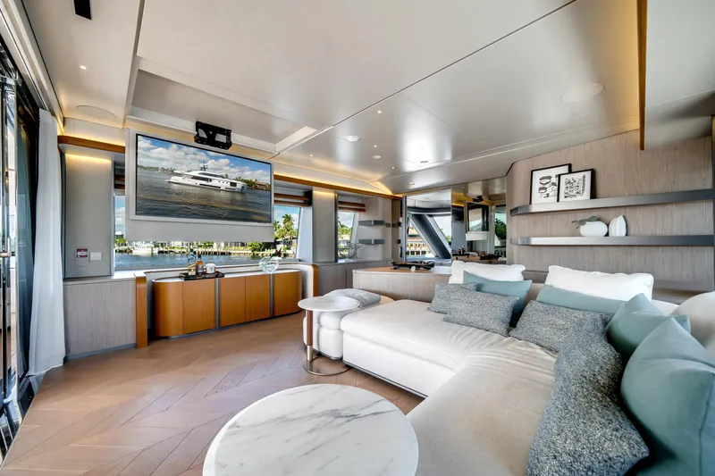 Slide: The Image of Luxurious interior of 2026 Azimut Magellano 30M yacht with modern decor and large windows. - 75