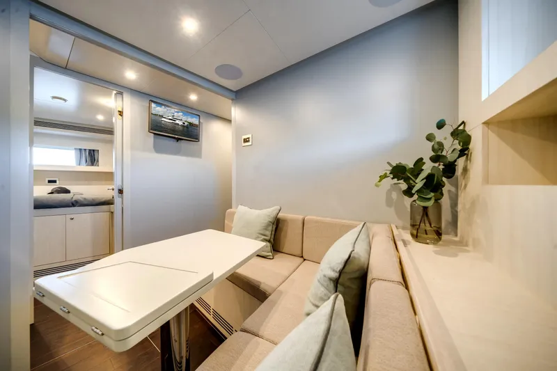 Slide: The Image of Luxurious interior of 2026 Azimut Magellano 30M yacht with modern seating and decor. - 84