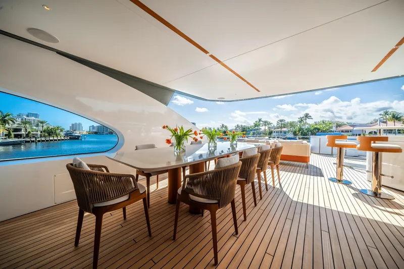 Slide: The Image of Luxurious deck of 2026 Azimut Magellano 30M yacht with elegant dining area. - 91