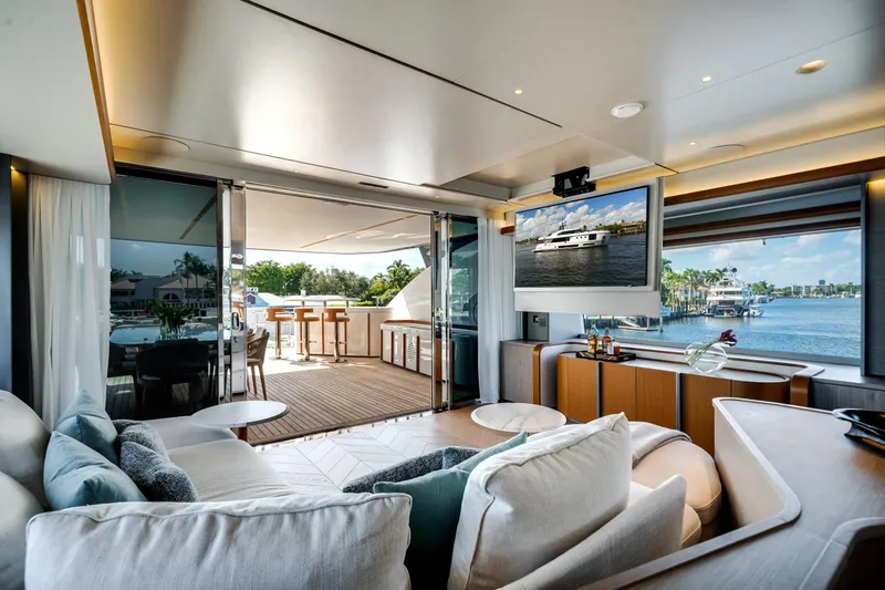 Slide: The Image of Luxurious interior of 2026 Azimut Magellano 30M yacht with elegant seating and waterfront view. - 94