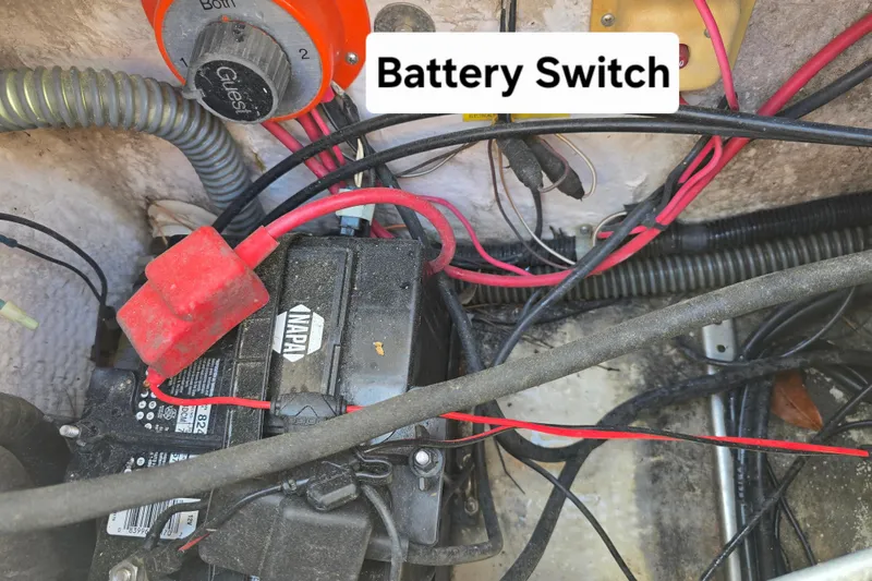 Slide: The Image of Battery switch and wiring in a 1992 Grady White 226 boat. - 14