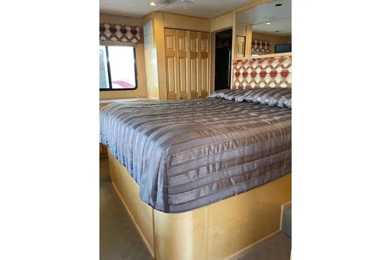 Slide: The Image of Luxurious bedroom interior on American Waterways Sundancer Trip, 2007 model. - 8