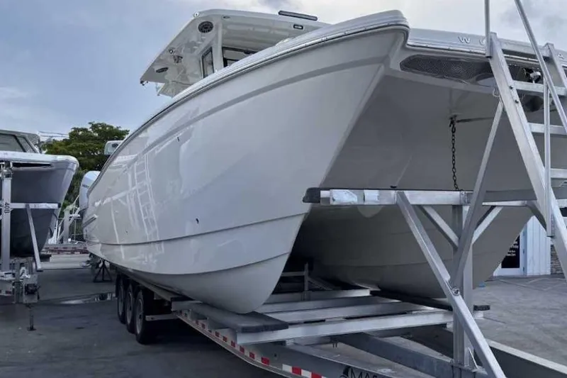 The Image of 2026 World Cat 400 CC-X boat on trailer, side view. - 0