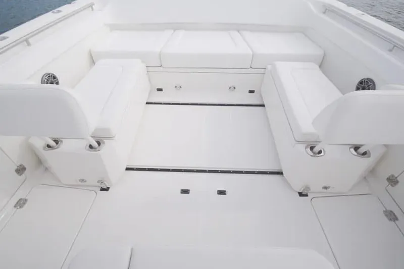 Slide: The Image of Manufacturer Provided Image: 2026 World Cat 400 CC-X boat interior with white seating and spacious layout. - 20