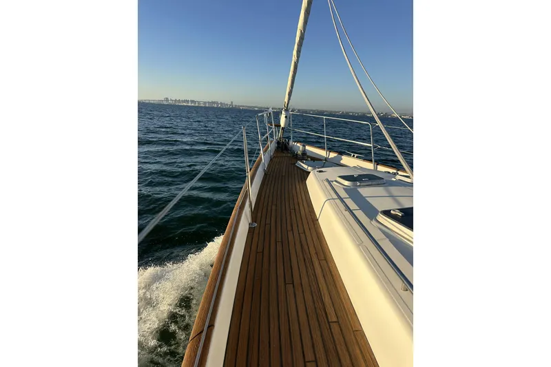 Slide: The Image of Sailing on a 2003 Beneteau 57 yacht with wooden deck, ocean view. - 109