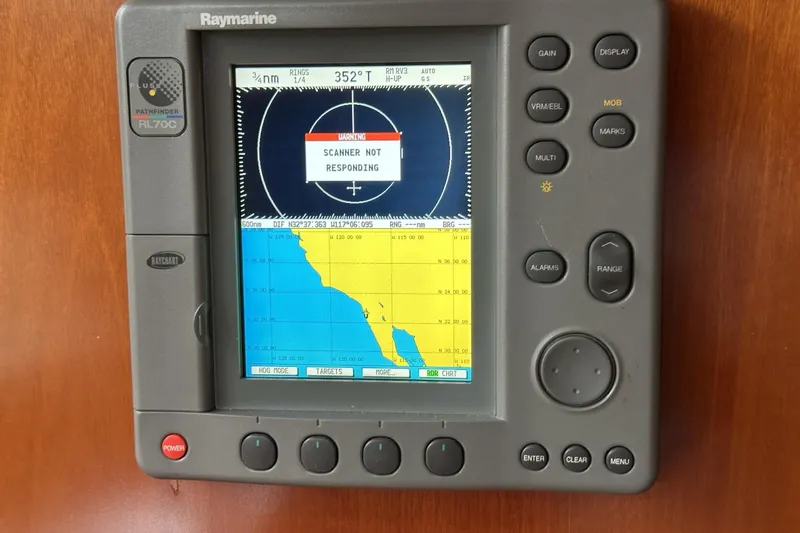 Slide: The Image of Raymarine Pathfinder RL70C radar display on 2003 Beneteau 57 yacht, showing warning message. - 59