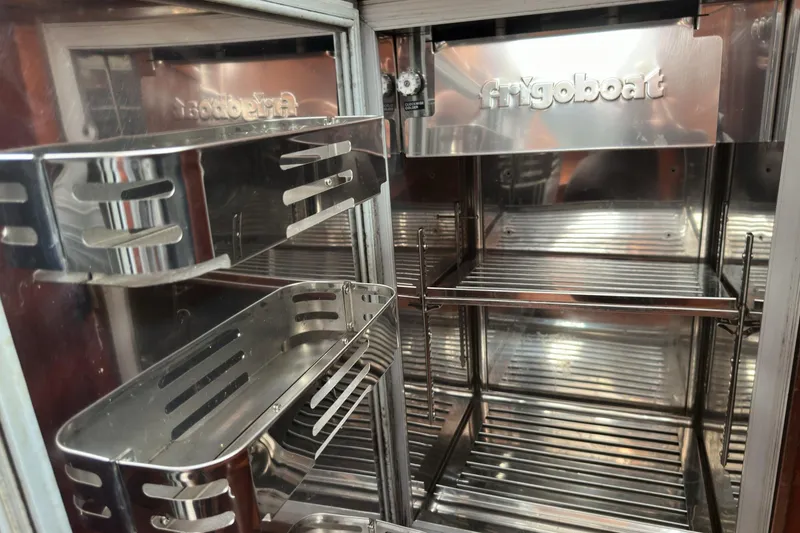 Slide: The Image of Stainless steel Frigoboat refrigerator interior on a 2003 Beneteau 57 yacht. - 67