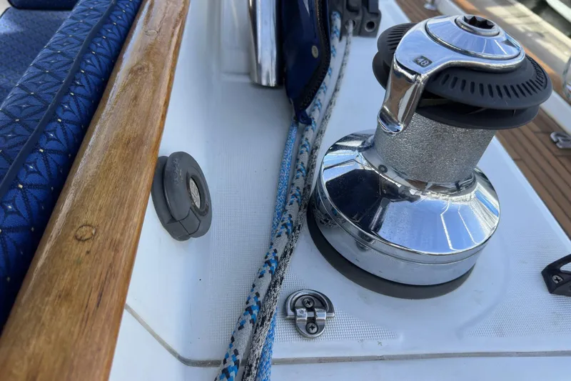 Slide: The Image of Deck of 2003 Beneteau 57 yacht featuring winch and ropes. - 85
