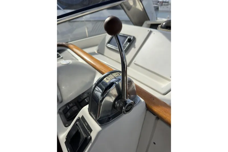Slide: The Image of Throttle control lever on a 2003 Beneteau 57 yacht cockpit. - 92