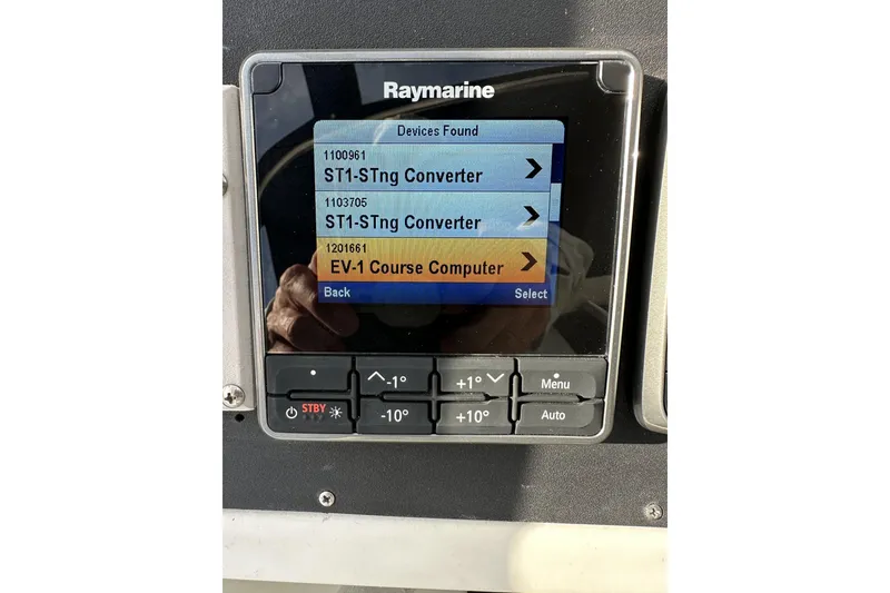Slide: The Image of Raymarine display on 2003 Beneteau 57 showing device connections and course computer options. - 95