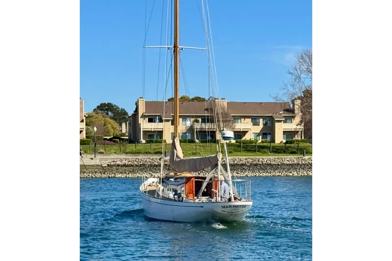 Slide: The Image of Sailboat "Marmetta" on water, Phillip Rhodes 42 model, 1946, near residential area. - 4