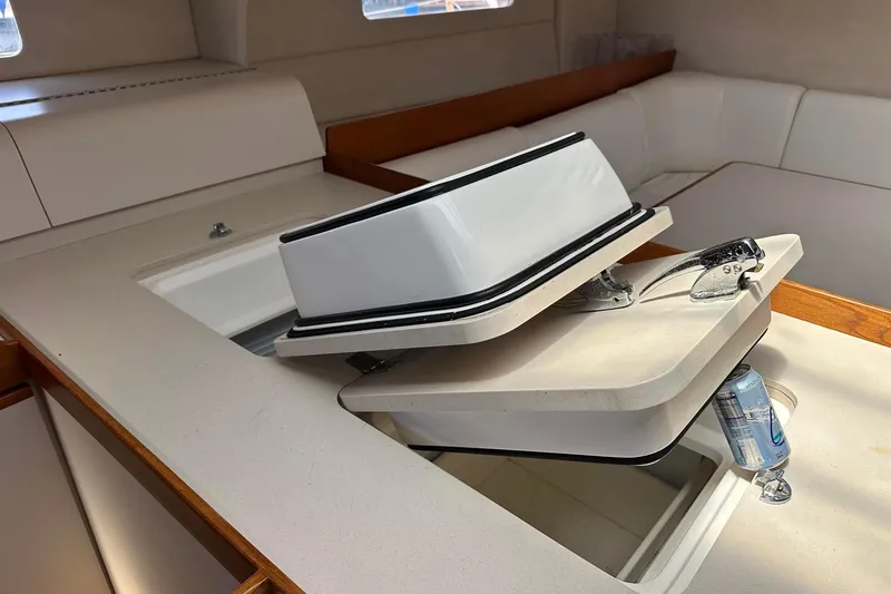 Slide: The Image of Interior of 1995 Sundeer 56 yacht with open hatch and modern design. - 51