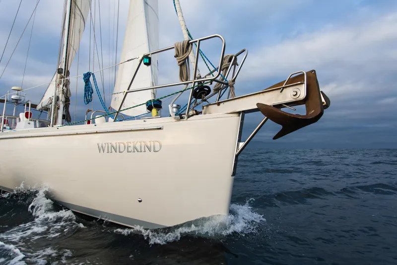Slide: The Image of Sundeer 56 sailboat "Windekind" navigating ocean waters, 1995 model. - 7