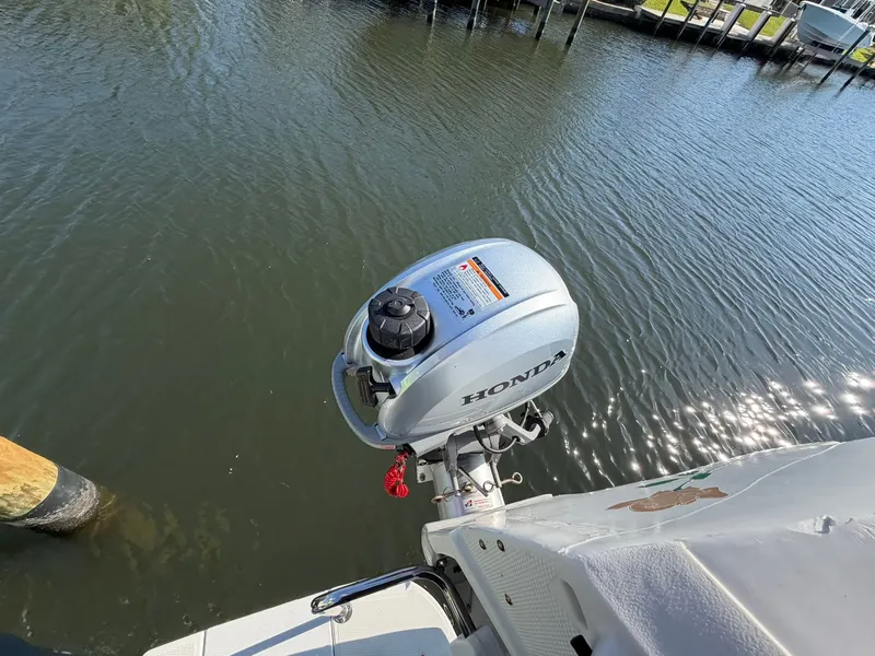 Slide: The Image of Honda outboard motor on Ranger Tugs R-31 CB, year 2013. - 12