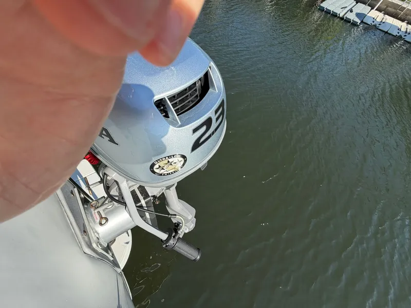 Slide: The Image of Outboard motor on a 2013 Ranger Tugs R-31 CB boat. - 13