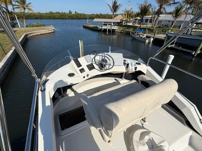 Slide: The Image of Ranger Tugs R-31 CB 2013 helm with waterfront view. - 18