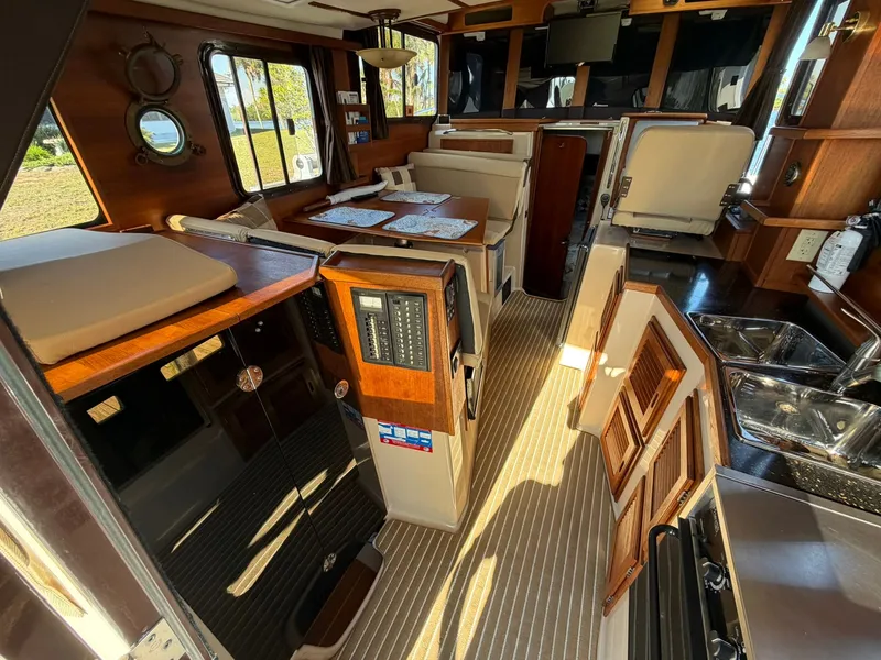 Slide: The Image of Interior of a 2013 Ranger Tugs R-31 CB yacht with wood finish. - 27