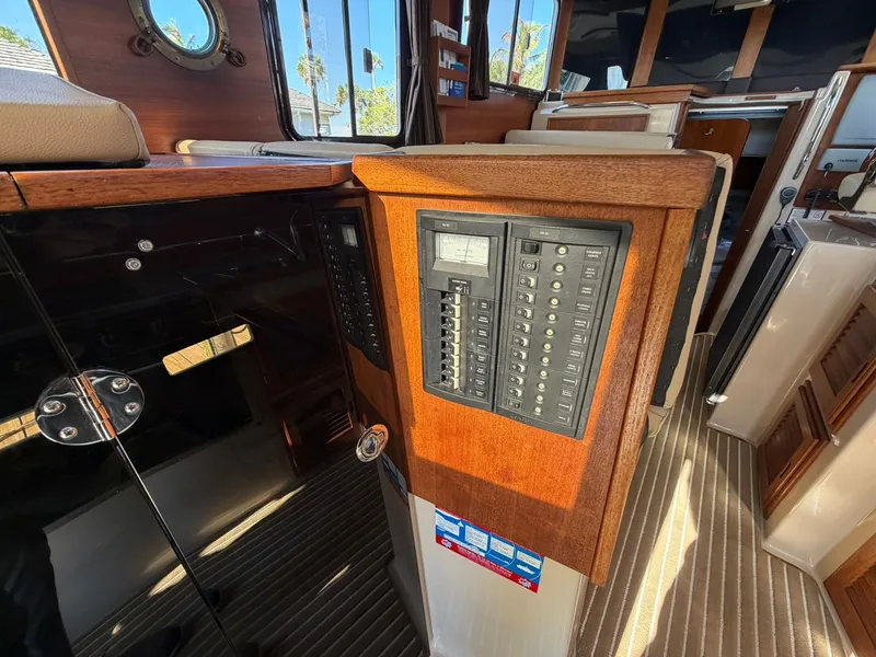 Slide: The Image of Interior view of 2013 Ranger Tugs R-31 CB with control panel. - 28