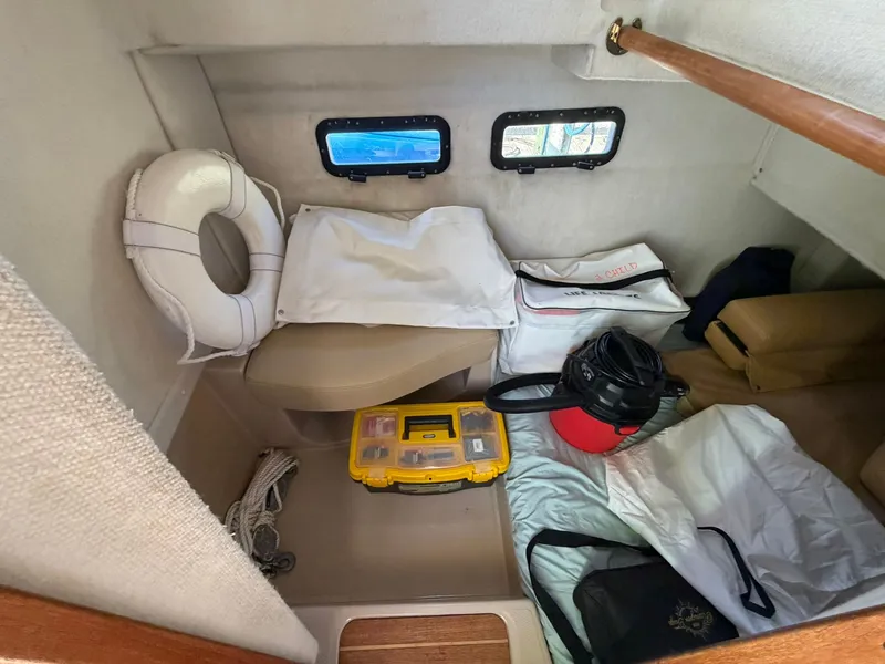 Slide: The Image of Interior of a 2013 Ranger Tugs R-31 CB with safety equipment. - 35