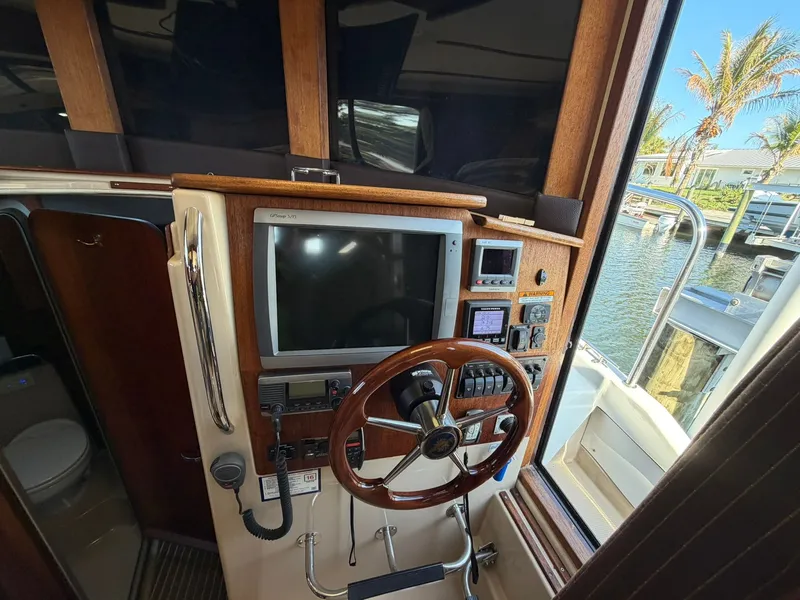 Slide: The Image of Interior view of the helm station on a 2013 Ranger Tugs R-31 CB. - 41