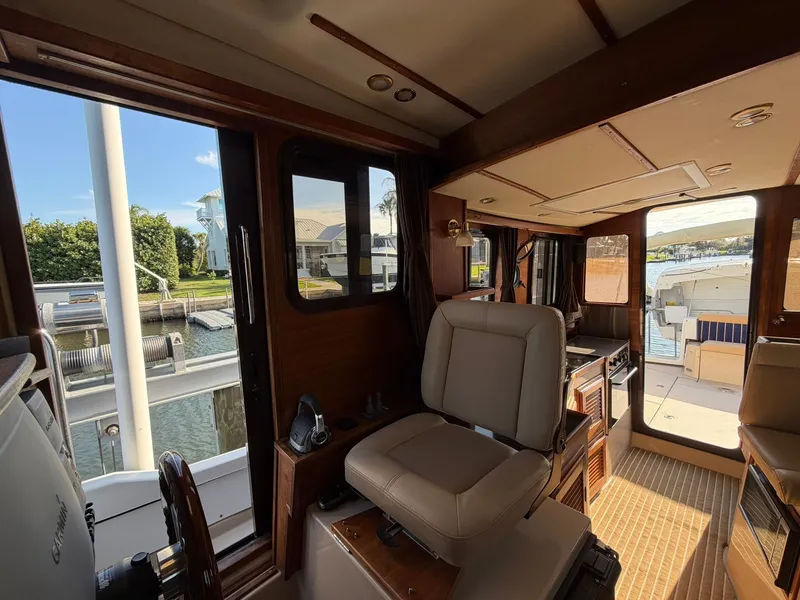 Slide: The Image of Interior of a 2013 Ranger Tugs R-31 CB yacht with seating area. - 45