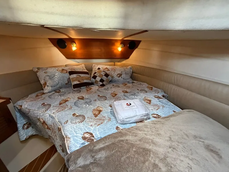 Slide: The Image of Interior of 2013 Ranger Tugs R-31 CB with cozy bed. - 46