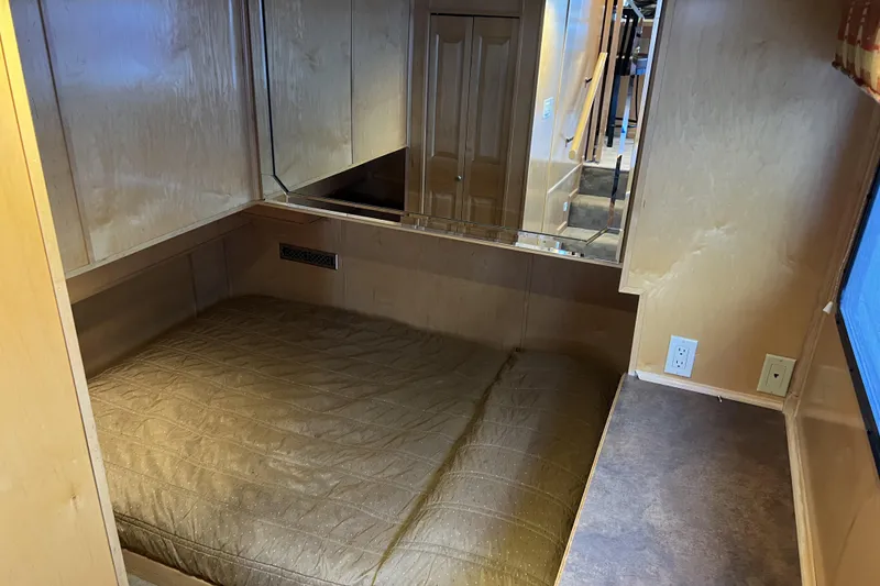 Slide: The Image of Cozy cabin interior of 2007 American Waterways Sundancer Trip #3, featuring a comfortable bed. - 16