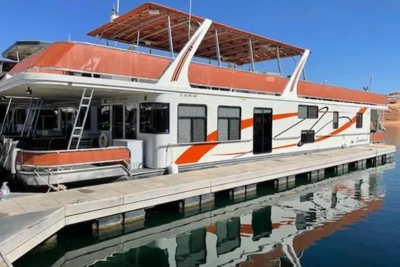 Slide: The Image of Houseboat docked on calm water, American Waterways Sundancer Trip #15, 2007 model. - 2