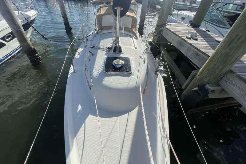 Slide: The Image of 2013 Hake Seaward 26RK sailboat docked at marina, top view. - 10