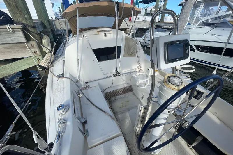 Slide: The Image of 2013 Hake / Seaward 26RK sailboat cockpit with steering wheel and navigation equipment. - 16