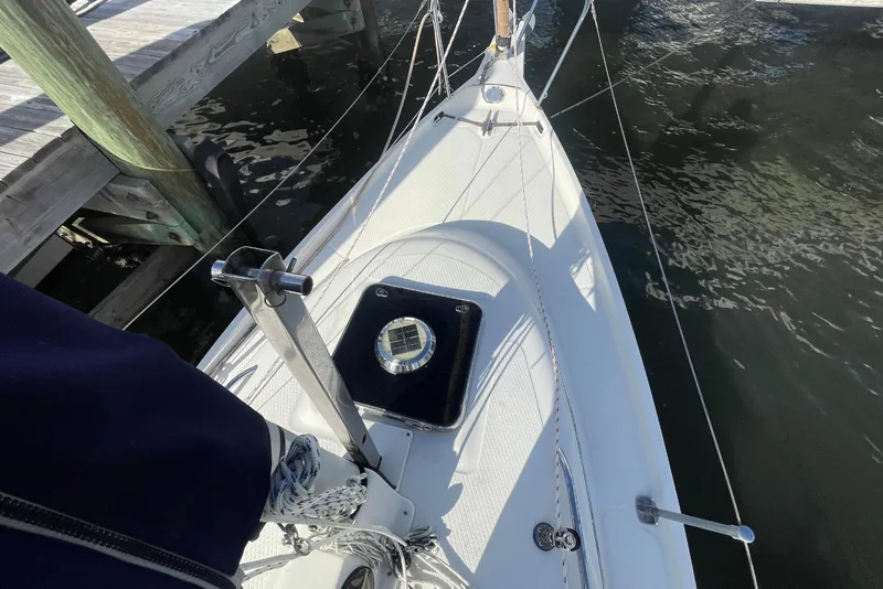 Slide: The Image of Top view of a 2013 Hake Seaward 26RK sailboat docked at a marina. - 19