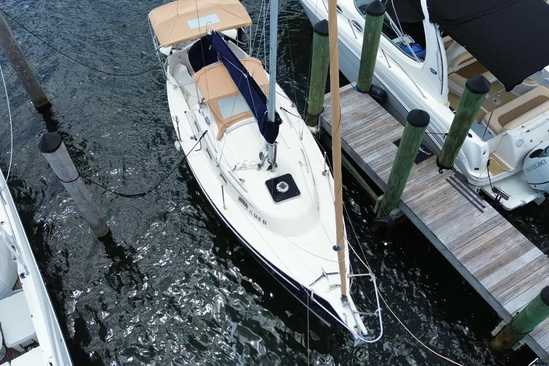 Slide: The Image of Aerial view of a 2013 Hake Seaward 26RK sailboat docked at a marina. - 35
