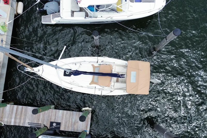 Slide: The Image of Overhead view of a 2013 Hake Seaward 26RK sailboat docked in a marina. - 37