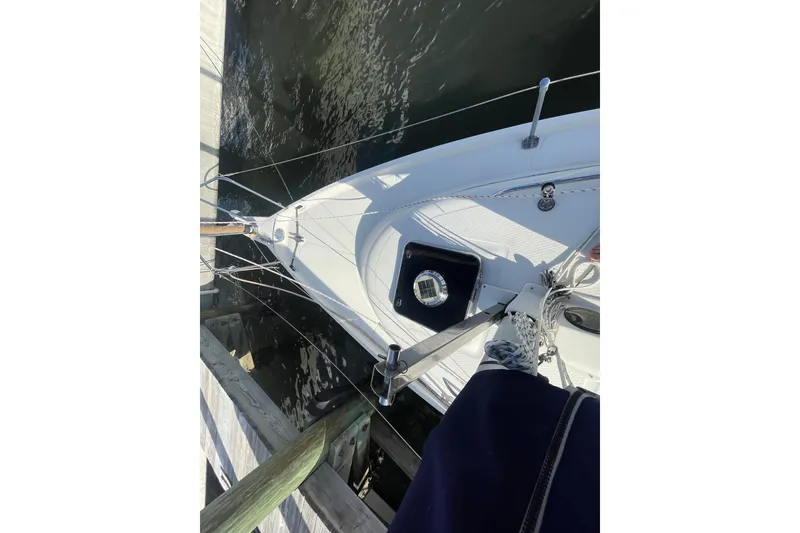 Slide: The Image of Top view of a 2013 Hake Seaward 26RK sailboat docked at a marina. - 8